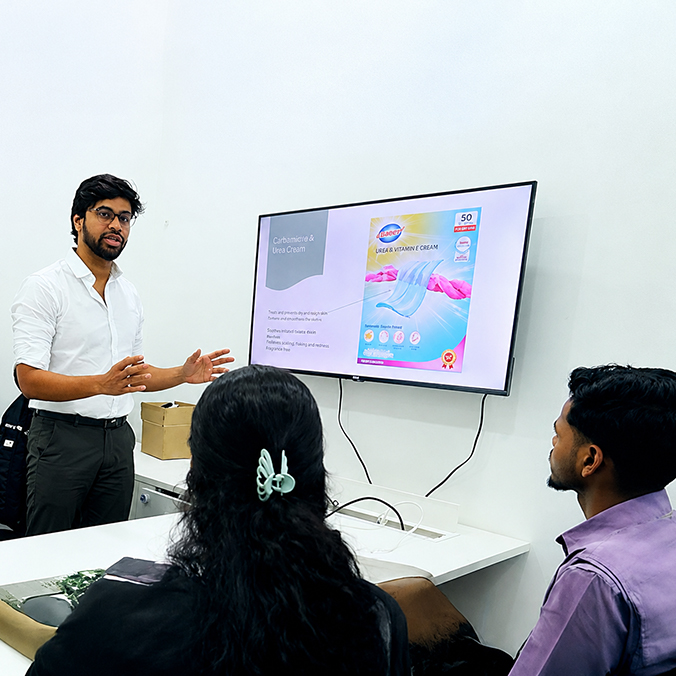 Employee presenting a product training session to colleagues at Pittie Group