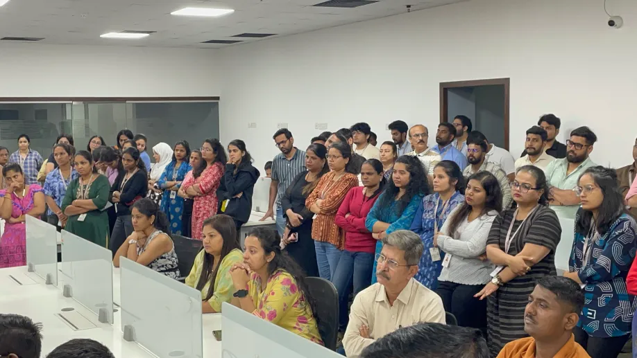 Employees attending a town hall meeting at Pittie Group