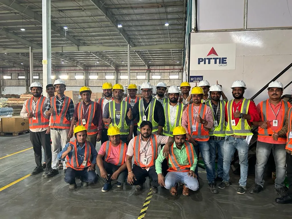 Warehouse team in safety gear at a Pittie Group facility